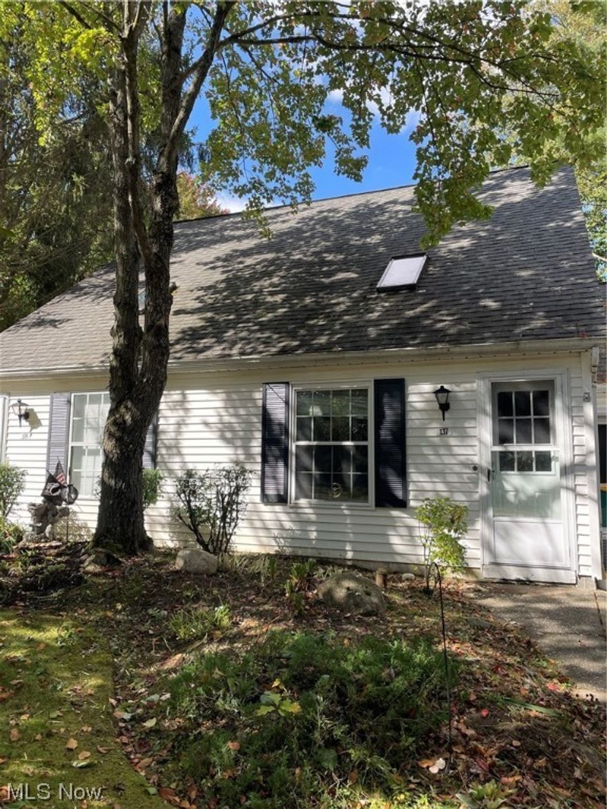 Nothing to do but move in this Awesome updated condo. Open and Spacious Living room features a vaulted beamed ceiling with sky light.  Eat in kitchen area is Complete with newer cabinets /tiled back splash/ updated counters and stainless appliances. 
The upstairs features an open loft concept with bonus room that is currently being used as a second bedroom. Freshly painted and 
newer carpeting throughout. Lots of natural light from sliders to the deck and multiple sky lights. Other recent updates include front door and screen door as well as new shower door. One car attached garage. Enjoy your private deck that overlooks a large, wooded area. Excellent Location- Close to everything in Chardon. Walk to Chardon Square. Burlington Oval has its own walking trails as well as being a 5-minute walk to the Maple Highlands Biking and Walking Trails System where you can ride for miles throughout Geauga County.