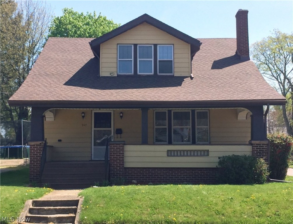 This newly remodeled 4 bedroom, 2 bath home is freshly painted throughout. A huge porch greets you out front. From the front door, you enter a large living room with carpeting, fireplace, oak built ins, oak trim, and oak crown molding. The dining room carries the carpeting, oak trim and crown molding theme through, and has a nice built in buffet. A carpeted first floor bedroom could be the master; a full bath that has just been renovated is directly adjacent. Next to the bath is a first floor laundry area with hook ups. Down the hall you pass a built in butler's pantry with tons of storage. The hallway leads directly to the recently renovated kitchen complete with ceramic and glass tile backsplash and brushed stainless steel accessories. A ceramic tile floor carries through the entire kitchen, hall, laundry, and bath. Upstairs, refinished wood floors carry through the hallway and all three bedrooms. The newly renovated full bath features a porcelain wood look tile floor. Built in lin