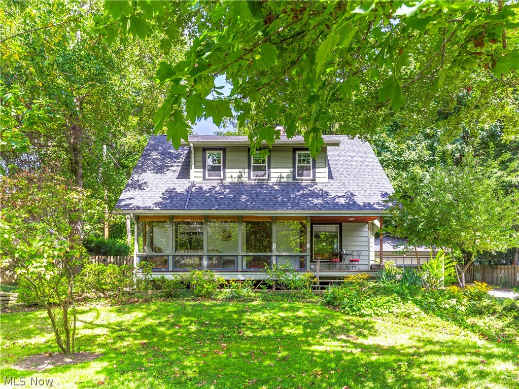 Welcome home to this lovely Silver Lake Estates Colonial! Tastefully updated to modern standards yet filled with vintage charm throughout. Nestled among the trees on a quiet street in close proximity to the beach and boat house. The entrance is through a large 3 seasons room that is cozy and inviting. The main first floor rooms have beautiful hardwood floors. The formal living room also has a wood burning fireplace and built in bookshelves plus a window seat. The formal dining room is spacious and has a trendy new light fixture. The kitchen has been updated with fresh paint, granite counters, stainless appliances, new floor and sparkling white back splash. There is also a first floor room with a closet that could be an office or den or even a 4th bedroom (if doors were added) all adjacent to a full bathroom renovated with a walk in shower/glass surround, marble and porcelain tile. Upstairs you'll find three more bedrooms with all new floors, the master bedroom has double closets, one