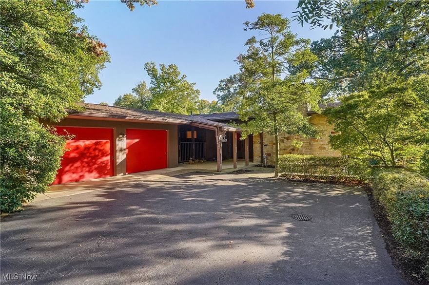 Rarely available lake front property on beautiful Silver Lake.   This Mid-Modern Century ranch home offers an incredible lakefront view that immediately captivates you the moment you step through the front door. The design is open & inviting, with large windows along the entire back of the house, ensuring the stunning lake view is always in sight. The great room features gorgeous vaulted wooden beamed ceilings, a stone woodburning fireplace with a concrete raised hearth with large windows to enjoy the lake view.  There are French doors leading from the dining room to an all season sunroom to relax year round.  The kitchen is massive, with an endless number of cabinets/drawers & walk in pantry w/two glass doors that open directly onto the deck, perfect for enjoying the peaceful lake views.  The spacious primary suite boasts 2 expansive walk-in closets plus 2 additional closets for extra storage and a slider to the deck.   Inside the primary suite is a private office, creating the perfect space for quiet work or personal projects or why not have a 3rd walk in close?  The other 2 bedrooms offer ample closets as well plus there is another full bath.  Let's not forget the first floor laundry room - again with an abundance of cabinets for storage.  The powder room completes  the first floor.  On the lower level, you’ll find an additional living space offering a full kitchen, recreation room with another stone woodburning fireplace AND the pool room complete with a heated Grecian swim spa/hot tub combination, walk in shower and joint access from the recreation room to a concrete patio - again to relax and enjoy the view. This room is temperature/humidity controlled and you would never know there was a spa in the home.  We even have a changing room for your convenience.  Another full bath, office/exercise area, and storage room with yet another access to the backyard completes the lower level.  The amazing covered porch is 27' x 15' and offers vaulted wooden ceilings.