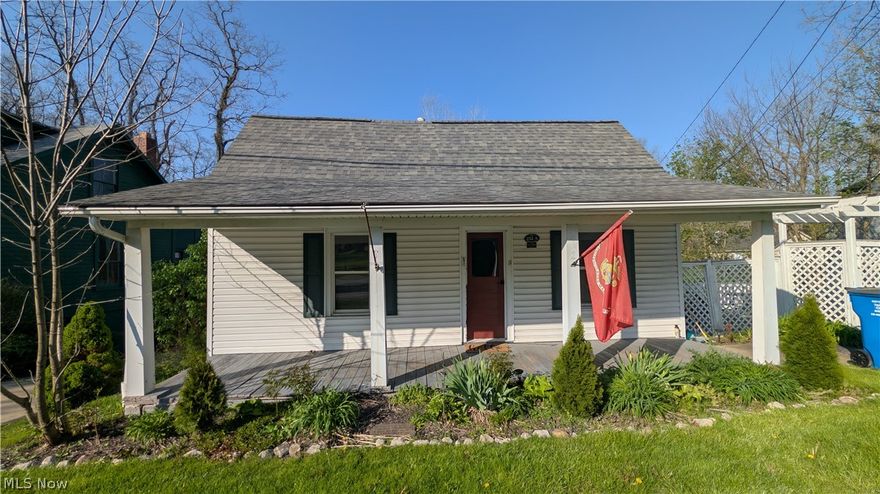 Unique opportunity in Chagrin Falls - Tucked into a peaceful, nature-filled setting, this rare .34-acre property offers two homes on one parcel. The main home is 1146 sq ft, and features two first-floor bedrooms, one with an added en suite bath. The kitchen includes stainless steel appliances, quartz countertops, and a breakfast bar, creating a bright and functional space for everyday living. An additional full bath with a stackable washer and dryer adds accessibility to the main level. Upstairs, you’ll find a third bedroom along with two additional rooms ideal for a playroom, sitting area, office, or extra storage. The home also includes a basement with an additional laundry area and a one-car garage.  Outside, enjoy the attached deck, generous green space, and storage shed, all surrounded by a quiet, natural backdrop.  The back house offers 748 square feet of living space with one bedroom, living room, dining room, kitchen, full bath, and laundry area with washer and dryer. The kitchen has quartz countertops and includes a refrigerator, stove, oven, and microwave.  With two homes on one lot, this property offers excellent flexibility for investment, rental income, guest accommodations, multigenerational living, or a unique Chagrin Falls retreat.