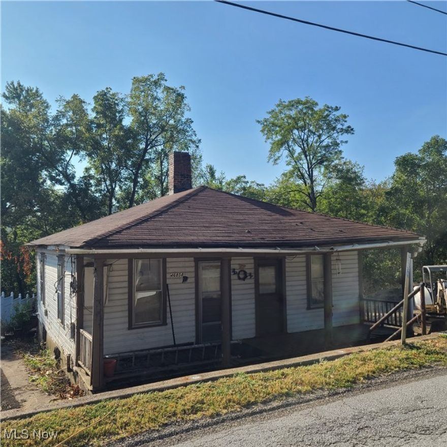 This 1-acre property, located in the quaint community of Fairpoint, OH, offers a fantastic opportunity for the right buyer. The existing 2-bedroom home is in need of significant work or could be a tear-down to make way for your dream build. With public water access already in place and a spacious lot, the possibilities are endless. Bring your ideas and take advantage of this rare find in a small, friendly neighborhood.