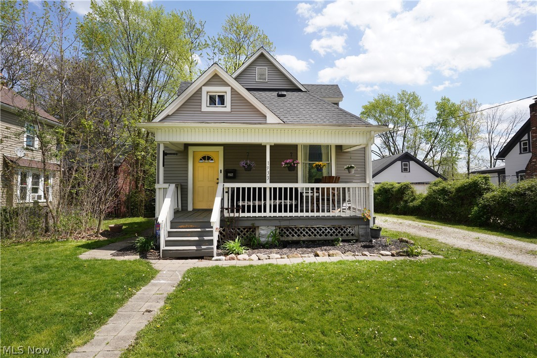 Adorable Cape Cod with 1st floor master bedroom and a full bath! Large foyer/entry leads to cozy living room, both with hardwood floors. Straight ahead is the eating area/dining room and kitchen with ceramic tile floors, white cupboards and all appliances that stay, pantry and full bath. On one side is the 1st floor master bedroom with double closet and nook that is perfect size for a computer desk or bassinet. Other side of kitchen has the side door out to the deck overlooking the .25 acre backyard with playset. Upstairs are two more bedrooms, one doesn't have a closet but has dormer area and entry to the second full bath. Full basement with glass block and sump pump. Detached 1-car garage has had garage door replaced with man door and coverted to man cave/she shed or music room or whatever you want it to be, complete with drywall, window a/c and heater. Could have garage door replaced and turned back into a garage. All kitchen appliances, washer/dryer, dining room hutch, deck table and chairs, and backyard playset stay. Updates include roof 04/24 with transferrable warranty, some newer windows, furnace parts 2023. Close to downtown Cuyahoga Falls and riverfront activities, Natatorium, library, expressway, and restaurants. Make your appointment today and start packing!