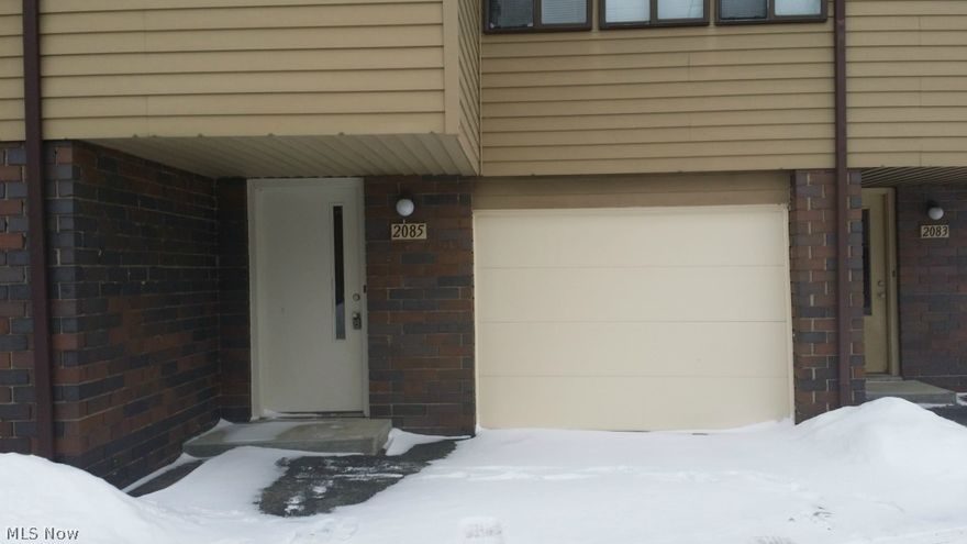 This adorable, affordable condo is ready for immediate possession.  This condo has a nice size loft bedroom.  The large living room has spiral stair case leading up to bedroom.  Updated bath right off the bedroom.  Small kitchen complete with stove and refrigerator.  Laundry hookup.  1 car attached garage.  Sliding glass doors off the living room leading to nice patio area.  Central air and more.  It is situated right down from the Firestone Golf course, minutes from Portage Lakes, expressway, shopping and more.  Call today for your showing.