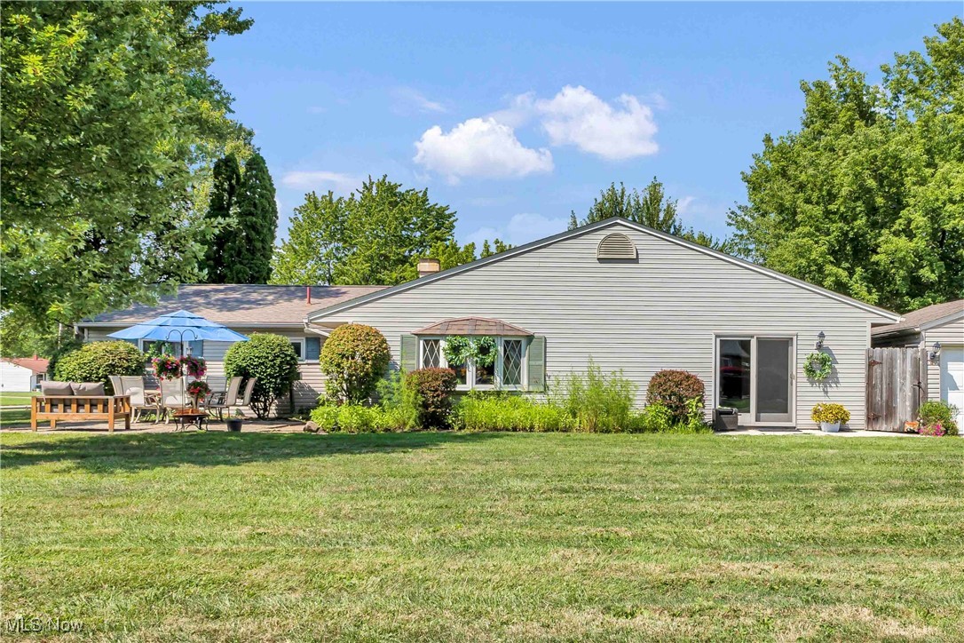 Welcome home to 34090 West Point Drive. A unique and desirable ranch-style home situated on a generous corner lot in a quiet North Ridgeville neighborhood. Offering 3 bedrooms and 2.5 baths, this home stands out with its expanded living space and flexible layout to suit a variety of lifestyles. Step inside to discover a bright and inviting main living area, seamlessly connected to a spacious kitchen and dining space. The kitchen offers plenty of cabinet and counter space perfect for the family chef and the large dining area is perfect for family meals or hosting friends. The home’s original garage was thoughtfully converted into a large family room, complete with a dedicated office space and a full bathroom—perfect for working remotely, hosting guests, or creating a private retreat. With existing plumbing already in place this area could be turned into a full in-law suite. The primary bedroom features an attached half bath, and two additional bedrooms share a full hall bathroom. The partially fenced yard offers a great mix of privacy and open space—ideal for kids, pets, or summer gatherings. Enjoy outdoor living on the patio, a perfect place to relax, grill or enjoy your morning coffee. The detached 2 car garage offers plenty of storage space. With the comfort of true single-story living, bonus space for work or relaxation, and a convenient North Ridgeville location close to shopping, schools, and highways—this home is truly a rare find! Don't miss this opportunity. Schedule your private showing today!
