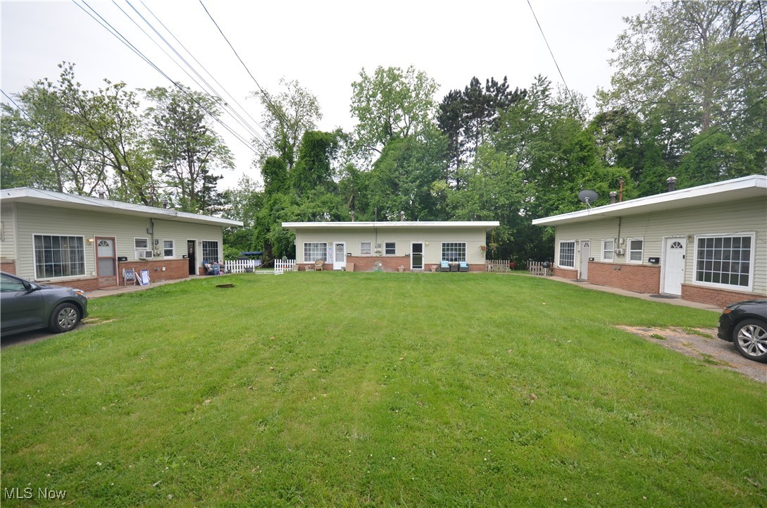 Akron multi-family investment opportunity in Ellet Schools (Betty Jane, Hyre, Ellet)! Total of 6 units located in 3 buildings. MUST ALL BE PURCHASED TOGETHER AT A PRICE OF $370,000. Each 2 unit sits on an individual parcel of land. Every unit is 1 bedroom and 1 bathroom with in-unit laundry. Vaulted ceilings in the living room and bedroom help the units feel more spacious. Windows on all buildings have been replaced approximately 6 years ago. All furnaces have been replaced approximately 6-8 years ago. New roof (2025) on 2358/2356, roof on 2350/2352 roughly 8 years old and roof on 2354/2356 roughly 10 years old. Akron water/sewer bill is paid by the owner (Approx. $270 per month) and all 6 units are currently on one meter. Dumpster is shared with the 4 unit apartment next door- owner currently pays $50 per month for their half of the dumpster expense. All units have a wall or window mounted AC unit provided by the landlord. All units have a range and refrigerator provided by the landlord. Good off street parking available. Units produce a gross rent of $3,665 monthly ($43,980 per year) - currently being rented below market rate with great opportunity for cash flow growth. Unit 2354 is larger than the other units- but still consists of 1 bedroom, 1 bathroom. Lawncare currently provided by tenant. No snow removal provided. 2350 has a lease through March of 2026 and 2356 has a lease through November 2025. All other tenants are month to month. Addresses are 2350, 2352, 2354, 2356, 2358 and 2360 Newton St. Property must be sold to one owner- and at closing there will be deed restrictions that if any parcel is ever sold to individual buyers that water meters will be required to be split and metered for each parcel separately. See MLS attachments for more information.