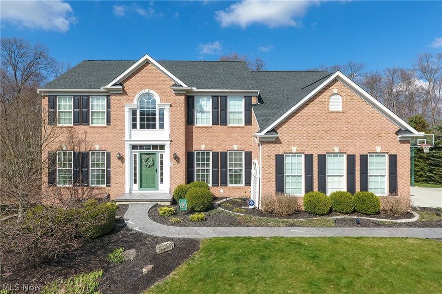 There are so many things to appreciate in the gorgeous home situated on the cul-de-sac on Pimlico in Medina. This home boasts a new roof, stamped concrete patio, and walkway, new AC just installed in 2019, all of the newer appliances stay including the washer and dryer. Washer and dryer hookups on the first floor for convenience. This 3500 square foot home also touts brand new, just refinished, wood flooring in the foyer and kitchen. The large eat-in kitchen is wide open to the family room and morning room for easy entertainment. Enjoy coffee and breakfast in a bright cheerful eat-in area. A partially finished walkout basement significantly increases the living space in this already ample home. The superior curb appeal was achieved through professional landscaping and the crowning jewel is the private, wooded back yard with patio and deck for quiet evenings in the warmer months or partying into the night on weekends. The woods behind the home are owned by the development so you won't h