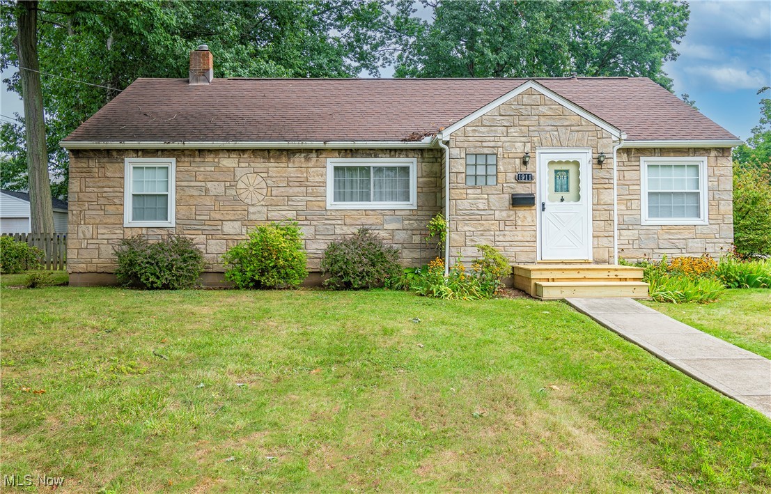 Welcome home to 1911 Ohio Avenue! This charming three bedroom, one bathroom ranch is situated on a generous corner lot with a fenced-in backyard. Step inside to find a well-maintained home with character at every turn. The kitchen comes complete with all appliances and a breakfast area. The heart of the home is a warm and welcoming living area and formal dining room, ideal for both relaxation and entertaining. There are three great-sized bedrooms, each offering ample space and natural light. The full bathroom on the main level is conveniently located for easy access. You will find a laundry area and ample storage space on the lower level. Sitting off the kitchen is a breezeway that seamlessly connects the home to the attached garage. Outside, the large, shaded, and fenced-in backyard creates a private oasis, perfect for outdoor gatherings and gardening. Don't miss your opportunity to make this well-maintained property your own. Notable updates include: range, garbage disposal, and front porch 2024, basement wall repair 2023, washer/dryer 2022, microwave 2021, sump pump and HWT 2019. Schedule your private viewing today!