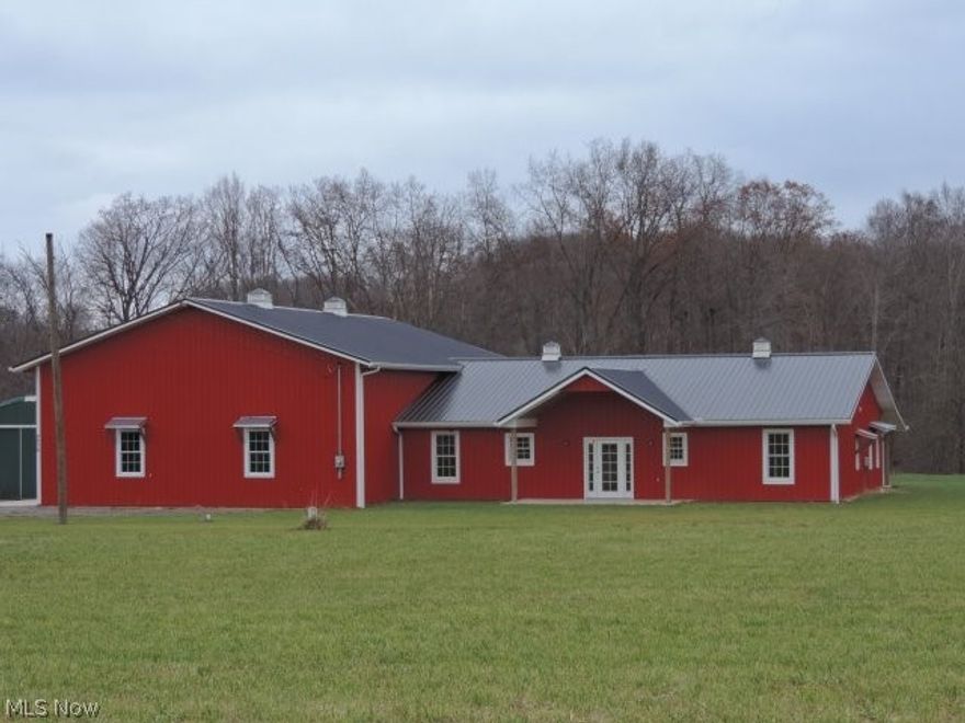 This is a one-of-a-kind property sitting on 8.6 acres. The building is of metal construction both house and garage. The heated 40X60 garage has hot and cold water, 16 ft. ceilings and three 14 ft. overhead doors. You can enter the 2,000 sq. ft. house from inside the garage through a fireproof door. This new ranch-style home has lots of closet and storage space. There are a lot of windows providing natural light throughout the home. A laundry and utility room is just off the mud room coming in from the eat-in kitchen that has stainless steel appliances with a breakfast bar to seat 6 and opens into the 18X28 family room. The French door off of the kitchen takes you out to a covered 8X50 patio looking over the back of the property which will be great for family gatherings. Spacious master bedroom with walk-in closet and a private bath. Well and septic new in 2016. There is an outbuilding for extra storage. The interior door are 36 inches wide. This property has a Bolivar address. FAIRLESS