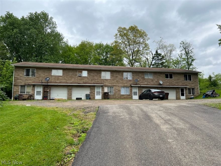 ATTENTION INVESTORS!  Looking for an investment property that has earning potential?  Four great units each with a 2 car tandem garage, walk out finished basement, a designated laundry room, and 100% occupied!  Most of the tenants have been there for some time, and all would like to stay.  With some upgrades to this property the rewards would increase.  All utilities (except water/sewer) are paid by the tenants.  Selling "As Is".