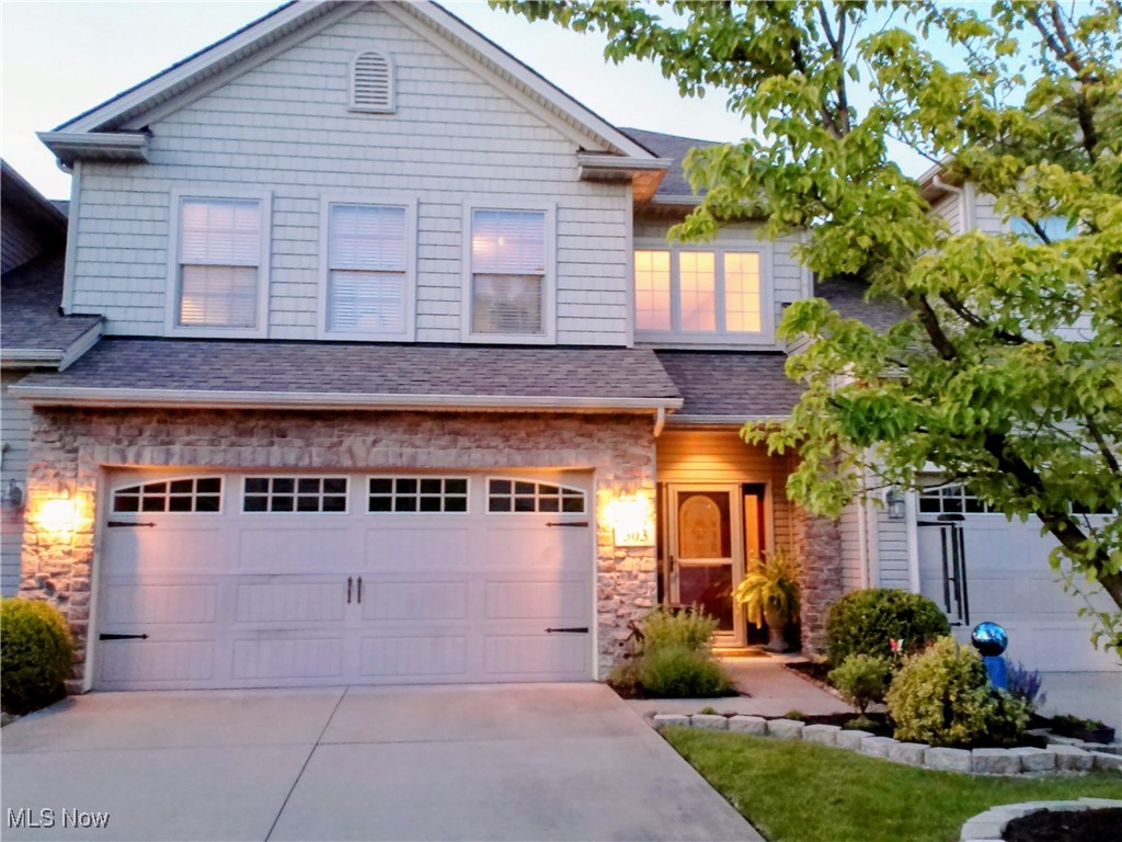 Prepare to be impressed! This rare, handicap-accessible Carriage home located in Shoreland Crossing was built by KNEZ Homes. This unit features 36-inch doors on bedrooms and bathrooms along with grab bars for added convenience.
The kitchen features granite countertops, a Travertine backsplash and newer stainless steel appliances In addition there is cabinet lighting, pull-out drawers, a breakfast bar and a walk-in pantry.
You'll love the open floor plan as you enter the living room with 10-foot tray ceilings, gas fireplace and it continues to a sunroom with vaulted ceilings and plenty of windows. Sliding doors bring you to a private back yard filled with beautiful landscaping, an extended patio, lighting and a tranquil waterfall.
First floor spacious Master bedroom has a master bathroom with an updated shower, a double sink and a walk-in California closet as well as two linen closets.
Upstairs is a spacious loft area and second bedroom, full bathroom and walk-in closet. This unique unit has the capability of adding 2 additional bedrooms.
A walking distance to the Metroparks Lakefront and shopping area, this beauty is a must see !!!