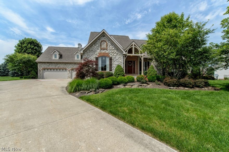 Make your appointment to see this fabulous, country french home in the desired St. James community!  The custom home features include a great room with a soaring beamed ceiling and gas fireplace, eat in kitchen with glazed maple cabinets, granite counters, and a formal dining room.  Off the kitchen is a hearth room with another fireplace and access to the covered porch.  The first floor master has a vaulted ceiling, walk in closet and large master bath with Jacuzzi tub.  A second bedroom is also on the main level with a full bath right across the hall making it an ideal guest room.   Plus, there's a 1st floor laundry.  The second floor is a kids dream with 2 more bedrooms, a full bath, huge loft area with built ins AND a secret "tree house" for the kids.  The finished lower level offers an additional 1500 sq. ft. of living space with 10' ceilings!   It's like a whole other home in the lower level with an enormous rec room with kitchenette, private office, craft room, and a large 5th be