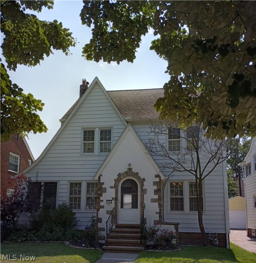 WELCOME home to this nice size colonial north of the blvd. with a oversized liv. room and formal din rm. Some newer windows enclosed sun porch. Finished bsment 3bdrms, 1 1/2 bths. fenced yard.boasts of a hugh garage, almost a 3 car and has walk up floored storage area. Walk to the edgecliff beachclub and view the beautiful sunsets off lake erie.