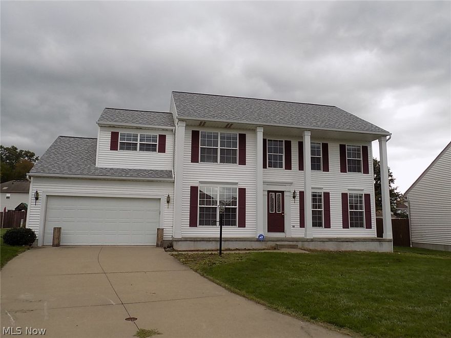 4 Bedrooms, 2 1/2 Bathrooms, Family Room with FP, Open floor plan, Formal Dining Room, 1st Floor Laundry, 2 Car Garage attached, Large Deck off back.