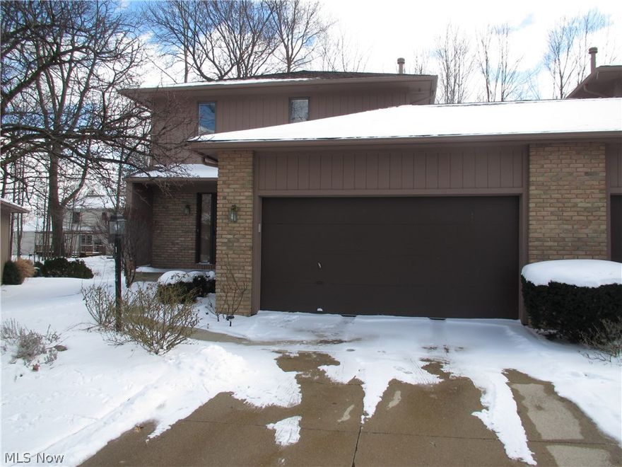 This very spacious Townhome is nestled on a quiet, wooded cul-de-sac in an upscale Strongsville neighborhood!  Step into the foyer, which leads to a large living room with gas fireplace, casement windows, and bamboo flooring that also extends into the dining room.  The sliding patio door in the dining room welcomes you out to your private deck.  Continue into the Eat-in Kitchen, where all appliances will remain.  There is also a half bath on the main level, next to the large, main-floor laundry room.  The upper level hosts a private Master bedroom with glamour master bath featuring double sinks, a large soaking tub, walk-in shower and walk-in closet as well as a skylight.  The 2nd Bedroom on the upper level also has a large, walk-in closet and its own private full bath!  Generous-sized basement with carpet throughout, which could easily be made into another living space.  The basement also offers additional storage.  The Townhome has been recently updated and fresh paint throughout.  T