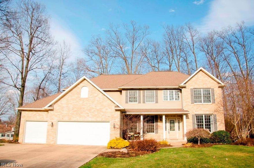 If you need space, both inside and out, without sacrificing elegance and quality, look no further. This home features 4 large bedrooms, 4.5 bathrooms, 3 car heated garage with hot/cold running water and a full finished basement with a kitchenette, family room, bathroom and 5th bedroom PLUS it's all situated on just under 3/4 of an acre in one of the top school districts in the state! This home is an extraordinary value and has had many updates since 2007. Updates include all newer appliances, including a double oven, granite counters, back splash, kitchen faucet and under-cabinet lighting in the kitchen, hardwood floor in the great room, dual 50 gal hot water heaters, garage heater, energy efficient LED lighting, bathroom faucets and some new windows. The two story foyer with hard wood floor & transom windows is just the beginning. From the gorgeous crown molding in the dining room to the lovely fireplace in the two story great room, this home has high quality construction and all the