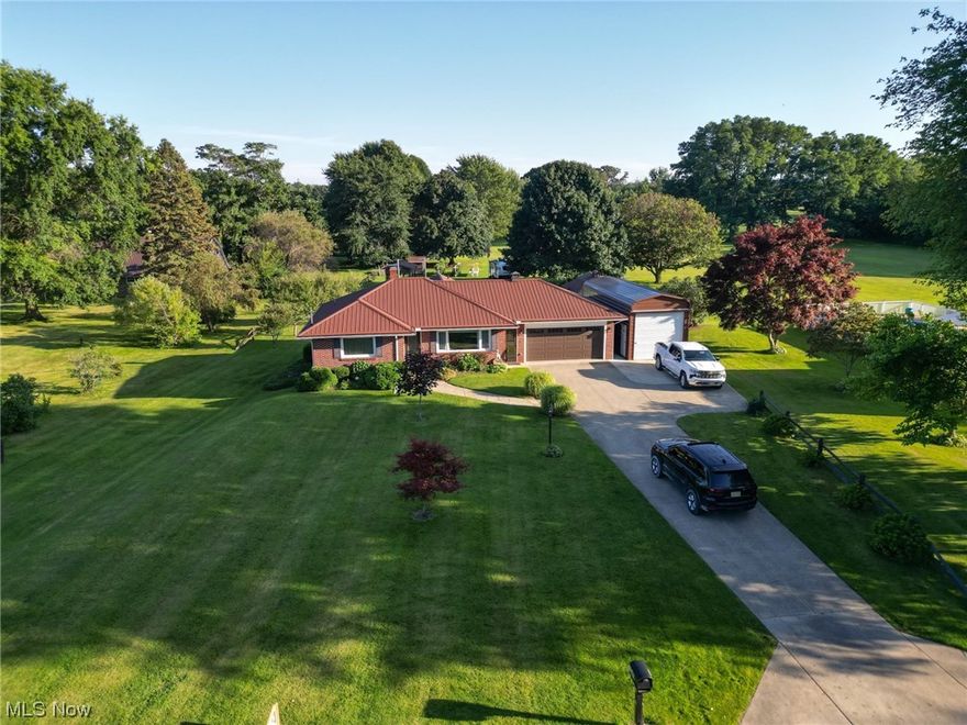 The best of all worlds: South side of Lake Road with a clear view of Lake Erie to the north and farm land to the south. This brick ranch is move in ready: new roof in 2023; new forced air gas furnace and cooling system/hot water heater installed in 2018; all new high end kitchen appliances in 2022; newly installed full baths on main floor and basement; finished bonus room in basement; the kitchen has Kraft Maid cabinets with open concept and hardwood floors just to name a few features. Have a boat or camper? This property features a 12 X 36 metal garage with 10-foot drive-through roll up doors to house your toys. The house sits on nearly an acre and a half in a great neighborhood just minutes from Conneaut Public Dock and some of the best Walleye fishing in the world.
