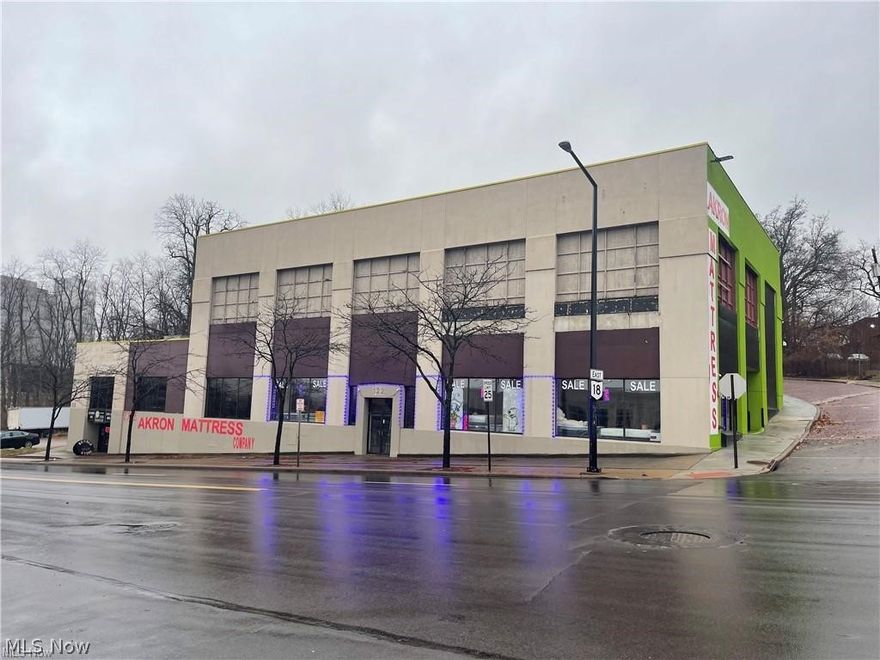 Attention developers and business owners! Here's your chance to own a versatile property in Akron that's bursting with potential. Almost 37,000 square feet of retail and warehouse space awaits your creative vision, just minutes from Route 8 and I-77. This prime development opportunity is strategically positioned as close to Downtown Akron as you can get, offering unparalleled convenience and accessibility for your business ventures.

The property, zoned for U4 commercial and U3 retail use, opens doors to a myriad of possibilities. Whether you envision a mixed-use development incorporating retail, office, or multifamily spaces, this property provides the ideal canvas for your ambitions. With the existing structure capable of accommodating additional levels, the potential for high-density multifamily housing with over 100 units or even a hotel is within reach.

Ample parking and a rich history as the "Gateway to Akron" or "Cadillac Hill" add further allure to this investment opportunity. Plus, with three-phase power already available on-site, you can hit the ground running with your development plans.

Seize this unique opportunity to be a part of Akron's growth and success story.