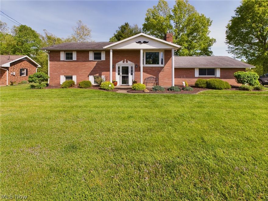 Inviting low maintenance brick split entry home with lots of room inside and out!  Enjoy summers from the 10x25 covered back porch looking out into the shady back yard.  Porch is accessible from the kitchen and the master bedroom for your convenience. The kitchen is adorned with KraftMaid cabinets and quartz countertops with KitchenAid appliances all updated in 2012 and in wonderful condition.  Speaking of updates, from 2012-2015 the kitchen, bathrooms, windows, exterior doors and basement were redone. 

The finished walk out basement has endless possibilities but relaxing by the fire this fall will be a must.  

Basketball hoop and playset will remain.