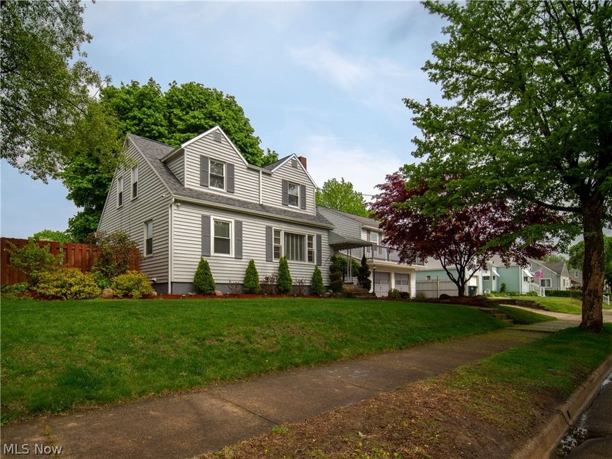 Stunning Summit Heights home just hit the market in Kenmore! This sprawling home features a total of 5 bedrooms, 3 full bathrooms, guest suite above the 2-car garage, and full walk-out basement, all on a large lot. The earth-toned tiled kitchen comes equipped with stainless steel appliances and composite sink. During the summer, you can entertain in style on the large deck, with a spacious fenced-in backyard, fire pit, and bubbling outdoor pond. In the winter, snuggle up to the wood-burning fireplace in the living room. The updated features in this home are plentiful: New laminate flooring throughout, new carpet on the stairs and second floor, newly updated upstairs bathroom with 2 vanities, new high efficiency Weil-McClain boiler (Feb 2021), new main roof (May 2020), and new exterior doors. The 1-bedroom guest suite over the garage features a full kitchen, bedroom, and newly remodeled full bath.