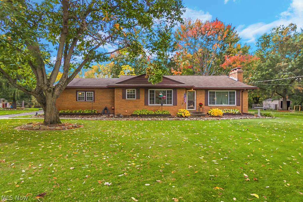 Welcome home to this meticulously maintained 2100+ square foot ranch on 1+ acre. The main features of this home are the beautiful landscaping and outside areas, the 3.5+ car garage, the finished basement, and the custom kitchen. This home has a sprawling floor plan with beautiful natural light shining in the large windows. The kitchen features full length, extra deep, handmade cabinetry, a planning center, and plenty of counter space. There is a finished basement, partially completed with Nature Stone flooring, an extra office or study area, and a full bathroom. This home can be used to host big family gatherings for the holidays, play outside with the family, entertain under the outside pergola, and much more. The owners are also offering a 1-year home warranty with the sale. Call today for a private showing!