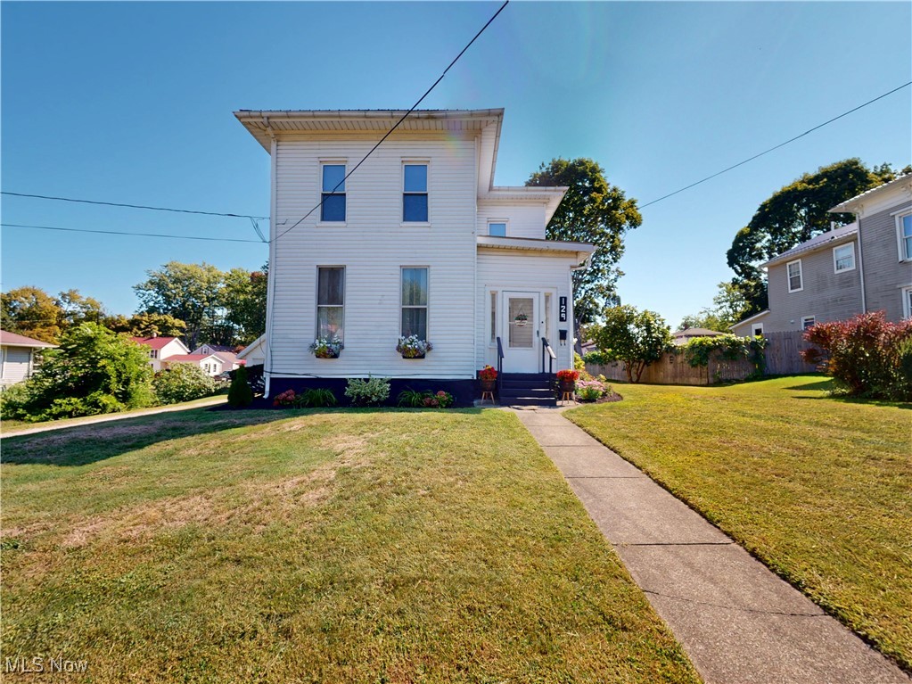 Welcome home to this charming 1875 farmhouse with newer metal roof, countertops and laminate flooring in the eat-in kitchen, bathroom and laundry room. Walk in thru the side door to a spacious mudroom/laundry room with huge closet and quaint storage nooks. Perfect area for shoes and backpacks keeping the rest of the house neat and tidy. Bathroom is conveniently located off the laundry room. It features the original claw foot tub, with shower ring, large vanity and newer laminate flooring. The eat-in kitchen is open to the large living room, making for functional entertaining or ease in supervising kids while you make dinner. Also on the main floor is a bedroom and the original parlor used as a beautiful dining room flooded with natural light. For those that want one-floor living, but don’t want to give up space, this layout would be perfect. Located close to shopping, parks and Geneva-on-the-lake. Call today to schedule your showing!