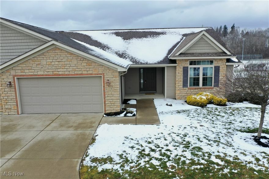 Welcome to this wonderful one-owner condo.  Well maintained and move in ready.  Front stoop leads to the open concept floor plan.  Featuring a living room with a cozy gas fireplace.  Kitchen with breakfast bar, walk-in pantry, and all the kitchen appliances staying for the next owner.  Beautiful granite countertops and Luxury Vinyl Flooring.  Dining area flows to my favorite room… The sunroom.  All the natural light and the patio door that lead to the deck.  This room will make any plant happy. First floor laundry with washer and dryer staying. Owners retreat with a walk-in closet and full bathroom.  This bathroom has a slight design twist, the seller wanted extra storage and it will impress you, wall to wall bottom cupboards along with double vanity and floor to ceiling linen storage.  Shower and toilet (water closet with pocket door) complete the owner’s retreat.  2nd bedroom with double closets.  2nd full bathroom completes the first floor.  Open staircase leads to a full unfinished walk-out basement.  Basement is plumbed for 3rd bathroom.  This space is a blank canvas just waiting for your personal touch.  Walk-out basement leads to the patio.  2 car attached garage with a little work space .  The location of this condo development is key with a community park, sidewalk that is great for walking the pup to the dog park, public library and the disc golf course.  Convenience of low maintenance living but plenty of outdoor options as well.