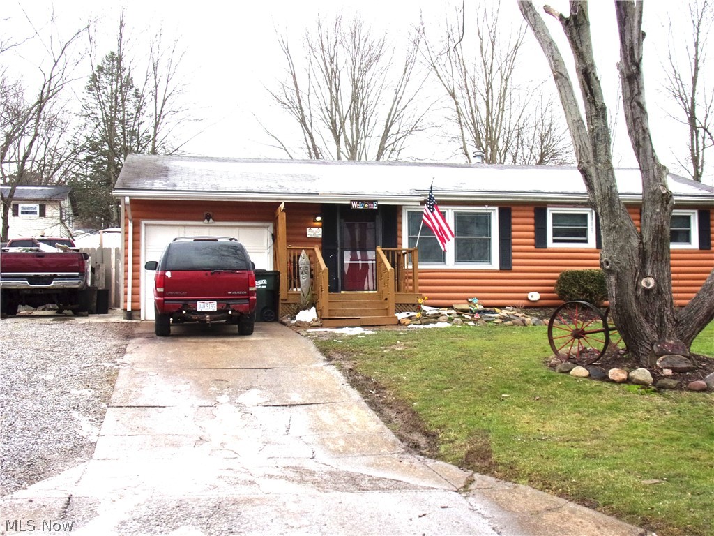 Here is the ranch style home that you have been looking for! Hardwood floors throughout this three bedroom 2 full bath home. Newer windows, furnace and AC. Fully finished lower level. Log cabin look vinyl siding. Fully fenced back yard with shed and playhouse and concrete patio. Kitchen appliances stay. Attached garage. This home is located on a quiet dead end street. Hurry and call to schedule your private showing before it is gone!