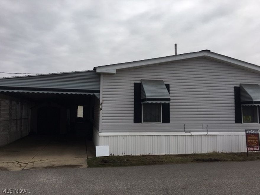 Move in ready, new carpet, new central air, new furnace and newer refrigerator and washer / dryer. Master bedroom with full bath. Two more bedrooms and full bath. Car port with shed and plenty of storage. Built in 2000. Double Wide. Monthly fee of $500.