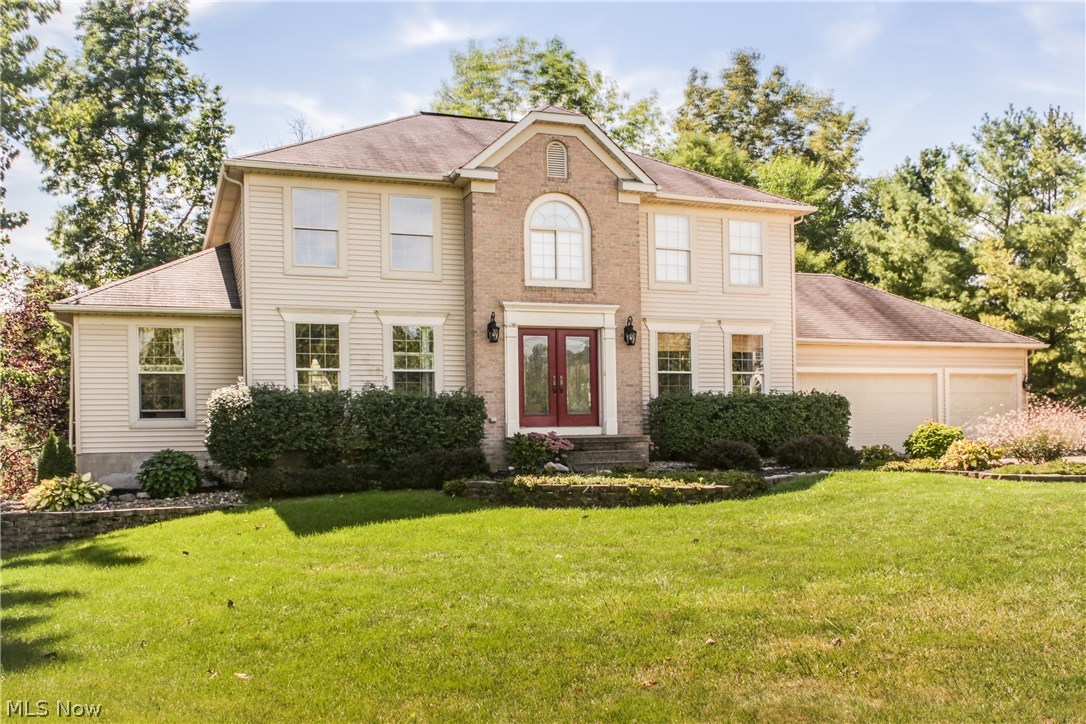 This phenomenal Colonial won't last! Beautiful house on a beautiful lot! Private, wooded back yard can be enjoyed year-round on the fenced-in, terraced deck, shaded when you like by an electric retractable awning. 4 BRs, 2.5 baths, 3 car attached garage, granite and stainless kitchen, first floor laundry, generous family room with gas fireplace, first floor office, living room, formal dining room, and last but certainly not least fully finished walk-out basement leading out to fantastic brick patio!! Call today for your private viewing! Also for sale, MLS # 3845634. Sale will be withdrawn if it rents first.