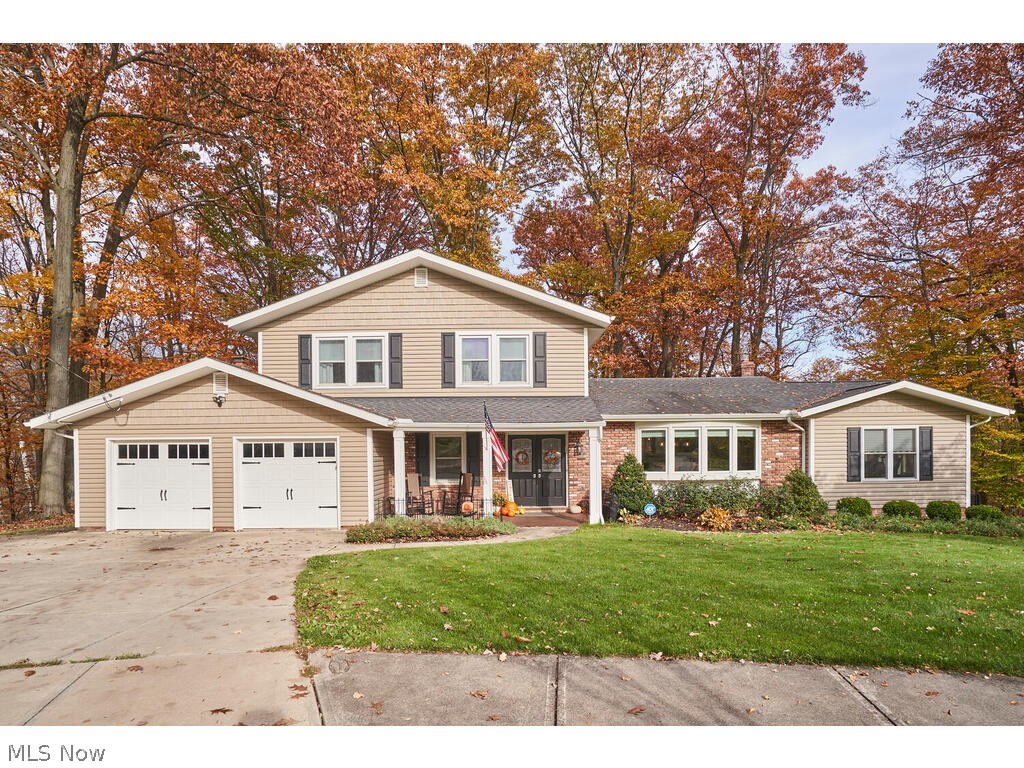Your search has ended! This home is beyond remarkable. Step in & you’re greeted w/a new foyer & an abundance of light. The FF was completely gutted to allow for a more open floor plan. You will be blown away by the custom new & expansive living & dining rm feat. high-end finishes, gorgeous Cambria counters, cabinetry & engineered hardwood floor throughout kitchen & dining area. Enjoy the breathtaking long-wooded views out your kitchen window. Just off this area is a LRG sunroom (2018) w/windows that surround you & access to the exterior porch. A quaint seating area is just off the kitchen where you can enjoy a cup of coffee w/calming & private wooded views. The FF offers a laundry RM, office & living space w/a cozy FP. Upstairs are 4 bedrooms w/2 full baths. Each bdrm is generous in size. A dresser/armoire can be added to one for a closet. The full BA was completely remodeled (2021). Step away from a long day & enjoy the master suite w/a private balcony to enjoy the outdoors, along w/