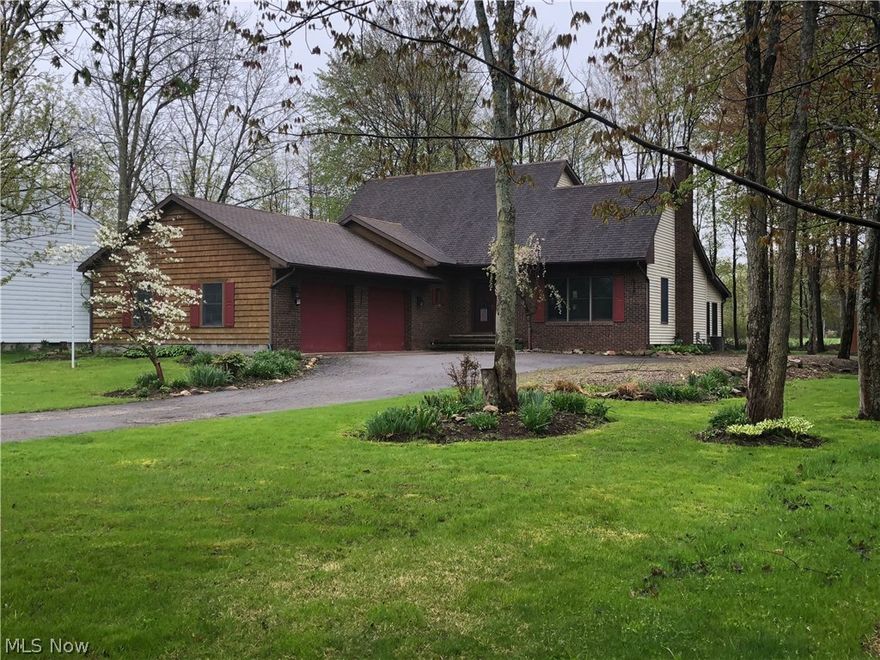 Country setting in Jefferson Village!!!  This well built home has well crafted woodworking throughout... you are amazed as soon as you walk in and see the foyer staircase overlooking the big great room with high cathedral ceilings and woodburner with full floor to ceiling brick wall. The woodburner is great on the snowy Jefferson nights to keep everyone cozy and heat up the whole house and keep those bills very efficient. This great room has plenty of room to relax after dinner or entertain with room for an extra dining area off of your big eat in kitchen with tons of counterspace  and cabinets for storage (all appliances stay). Step down to your own office space or extra sunroom that walks out to nice size deck with pad and electric all ready for hot tub. Nice wooded setting in this  back yard with no neighbors behind you just right for those family picnics and camp outs. Nice paved drive and extra stone drive extension for camper or big RV. Master bedroom  and master bath with linen