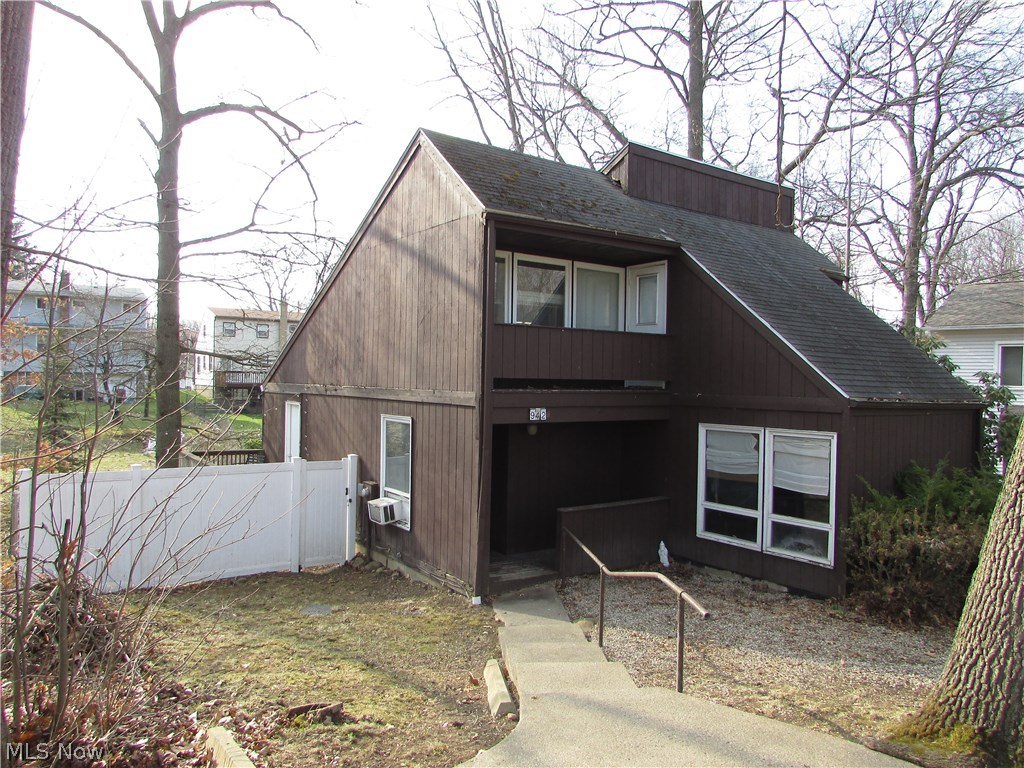 A very unique contemporary with 3 bedrooms and 2 full baths. The entire upper floor is a large master suite, that overlooks the rest of the home. There is a family room, and a living room. The kitchen is updated, and comes with all the appliances. There is a full walk out basement. The back yard is completely fenced with a vinyl privacy fence.