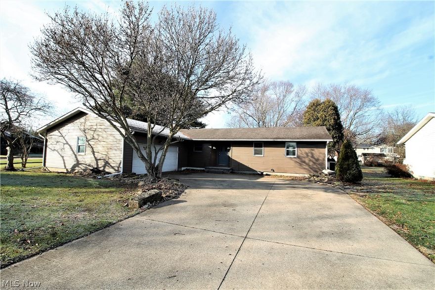 Fabulous ranch! Welcome home to this charming three-bedroom, two full bath home. This home offers so much, such as rustic trim work, new flooring throughout, new modern lighting, living room and large family room, gorgeous dining room which is open to the kitchen. The inviting kitchen has been updated offering stainless steel appliances, double oven, farmer sink, island, plenty of cabinets. The living room is right off of the dining room/kitchen and is open to the large bright family room which has sliders to the backyard offering natural sun light to shine through. Plenty of room for entertaining or just relaxing in both of these rooms. There are three bedrooms with some with new closet doors and two full bathrooms which have been freshly painted, laundry on the main level. There is a covered back patio with ceiling fan. Lower level is finished offering lots of room, storage, work out area, etc. Come outside to the beautiful, large backyard. Again, so much room for entertaining, or ju