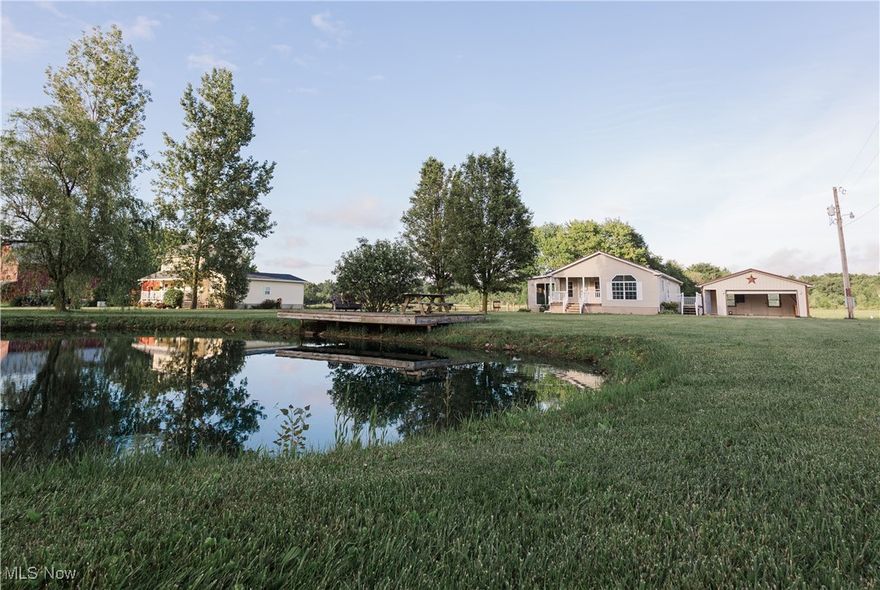Escape to your private country retreat at 419 County Road 281 in Sullivan, OH, where nearly 1.76 acres of gently rolling land offer the perfect blend of modern comfort and peaceful rural living. This charming 3-bedroom, 2-bath home is surrounded by working farms and wide-open fields, delivering breathtaking views in every direction and a true sense of privacy and serenity. A picturesque pond in the front yard enhances the natural beauty, offering a peaceful space to relax, fish, or enjoy the changing seasons. The home has been thoughtfully maintained with numerous updates throughout and is serviced by reliable city water. All appliances are newer, will convey with the sale, and the home is completely move-in ready—making your transition to country living seamless. A spacious 2-car garage adds functionality and additional storage. This is more than just a home—it’s a lifestyle, where modern amenities meet the charm of country life. Just minutes from the heart of Sullivan, you’ll enjoy the tranquility of a farm-surrounded retreat while remaining close to small-town conveniences. Whether you’re starting a hobby farm, planting your dream garden, or simply searching for a peaceful place to call home, this unique property offers the perfect backdrop for a life connected to nature.