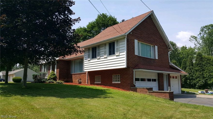 Charming 4 bedroom brick home with plenty to offer...2 full baths with new plumbing, 3 beds on main floor, 1 bed on 2nd floor with full bath, 2 car attached heated garage on right side of home, 1 car attached garage on left side of home, 1 car detached garage, wired for 220 electric, newer aeration septic system (approx 4 years), public water, hand dug well still functioning, newer roof (approx 4 years), 2 gas furnaces, add on wood burning furnace to supplement your heat, central air, 2 gas fireplaces (1 in large living room, 1 in bedroom), 3 seasons sun porch, newer hot water tank, 9 x 21 attached workshop with overhead door, whole house generator hook-up, water softener, 3rd shower in basement, electric dog fence, outside flood lights. Nestled on a quiet dead end street butting up against 125 acres of woods (not owned by seller). Has been a family home for 67 years. Seller will consider land contract/owner finance offer with significant down payment.  Schedule your private showing to