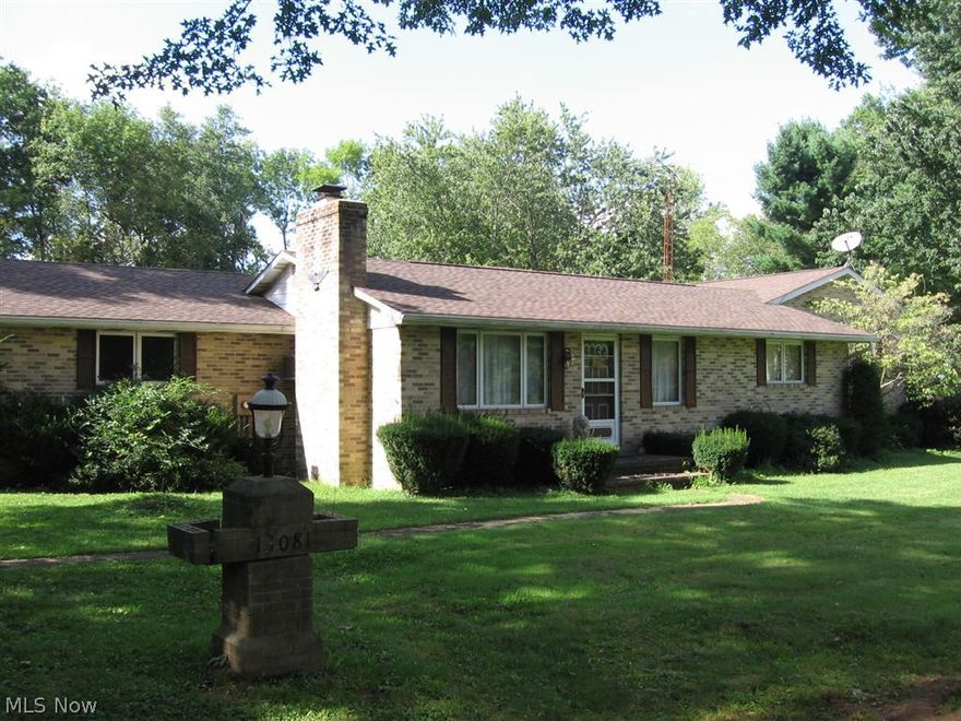 This wonderful all brick home offers; applianced kitchen, 1st floor laundry, 2 bedrooms, with bonus room, excellent for nursery, office, or possible 3rd bedroom.  2 full baths, one is on 1st floor with 2 entrances, 2nd is attached to master bedroom, both have double sinks.  3 season Florida room fully done in cedar offers a full wall of windows & sliding patio door leading to 12 x 24 covered deck.  Bay window in dining room offers excellent views of abundant wildlife.  2 car attached garage with water, electric, floor drain, garage door opener.  Roof was replaced in 2011 with life-time shingles.  Basement was water proofed in 2013 with life-time transferable warranty.  All window treatments stay.  This property also offers a huge 24 x 32 pole barn with an over sized door & double man doors.  Was formally used for semi tractor parking, it offers many uses, R.V. parking, multiple vehicle parking, or just a mechanics dream garage with electric, including 200 volt, fluorescent lighting, fl