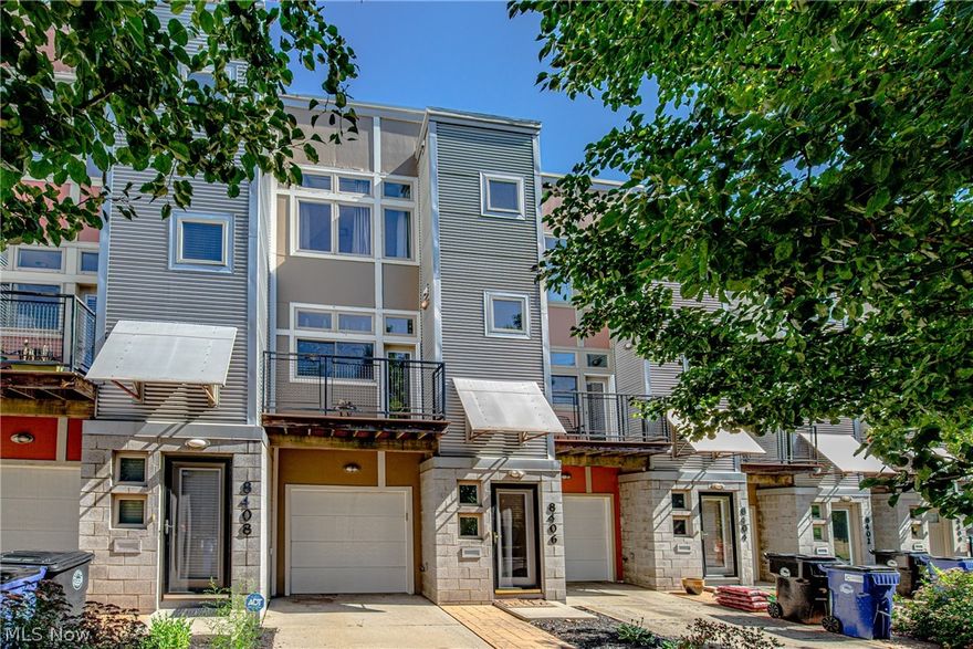 AMAZING OPPORTUNITY! 3-Level Townhouse in the heart of Ohio City and Gordon Park Square with shop's, dining/entertainment and Downtown just moments away - set on historic Franklin Blvd, this 2 bdrm; 2 bath contemporary style homes is ideal... entering the front door is a generous Foyer leading to attached 1-car garage and Family Room with patio doors overlooking quaint fenced courtyard - Second Level features the expansive Living Room with floor to ceiling windows, Open Kitchen provides ample cabinets and granite countertops (all appliances included); From Kitchen there is a walk-out patio/balcony overlooking Franklin Ave - Third Level gives privacy for Master en-suite, Second Bedroom/Office + full guest bath.  Tax abatement still remaining.  Schedule your private tour today!