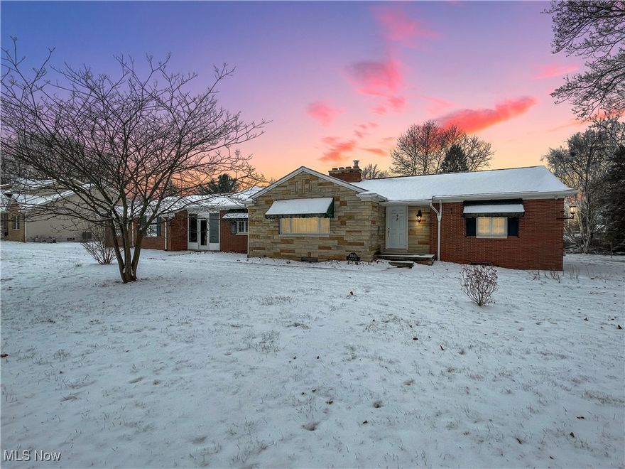 Looking for one-floor living and over an acre of your own? This charming ranch home set on a huge, sunny lot features classic brick and natural stone exterior with timeless appeal and modern conveniences. Lovingly maintained and move-in ready, this residence offers neutral decor and thoughtful details throughout, such as a whole-house generator, lighted closets, overhead lighting and ample storage. Clean and efficient heat with the boiler baseboard system. The bright eat-in kitchen features appliances that stay, a large window overlooking the generous backyard, as well as plenty of counter space and a convenient lighted pantry. The garage is attached via a breezeway, making it easy to bring home groceries and packages. Main bath features large vanity with double sinks, and white tiled tub/shower combination. Two large decorative fireplaces add to the charm of this home: one in the spacious living room, one in the basement. Basement is plumbed for a full bath. Washer and dryer stay. Home warranty for your peace of mind.
Ideally located close to everything you need, this oasis is ready for you make it your own.