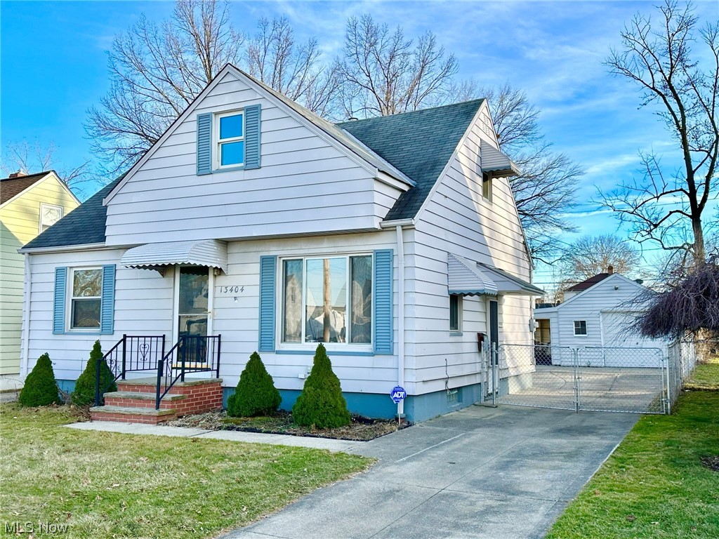 Welcome home to this completely remodeled and move in ready bungalow. Modern kitchen features new stainless steel appliances along with Kraus sink & faucet, new cabinets and new vinyl floors. Beautiful living room with new carpeting. Two bright and cozy bedrooms on the 1st floor and a nicely updated bathroom with new vanity and LVP flooring. Upstairs you will find 2 more bedrooms with plenty of closet/storage space and new carpeting throughout. Partially finished basement with new LVP flooring. Freshly painted throughout! Other updates include: New LED lighting throughout! Newer Electrical Panel! Fenced yard and a covered patio! Detached 1 car garage with new slab and storage in the back. Stop wasting money on rent! This is the one you have been waiting for!