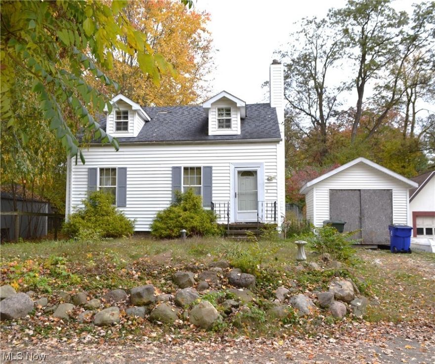 Cute Cape in Brady Lake has tons of potential! 2 Bedroom, 1.5 Bath. Large Living Room. Knotty Pine Kitchen with eating area includes the range and dishwasher. Spacious Main Bath with linen closet. Additional room on 1st floor could be an office/computer room or huge walk-in closet. Upstairs, you will discover the Master Bedroom with dormer, charming built-ins and hardwood flooring. The guest room also features a dormer and hardwood flooring. Additional half bath in the basement. Vinyl Siding and some updated vinyl windows. Private backyard. Storage shed. This home has been vacant for 5 years. There is deferred maintenance that needs addressed and it will not qualify for FHA or VA financing. Being sold in "AS IS" condition.