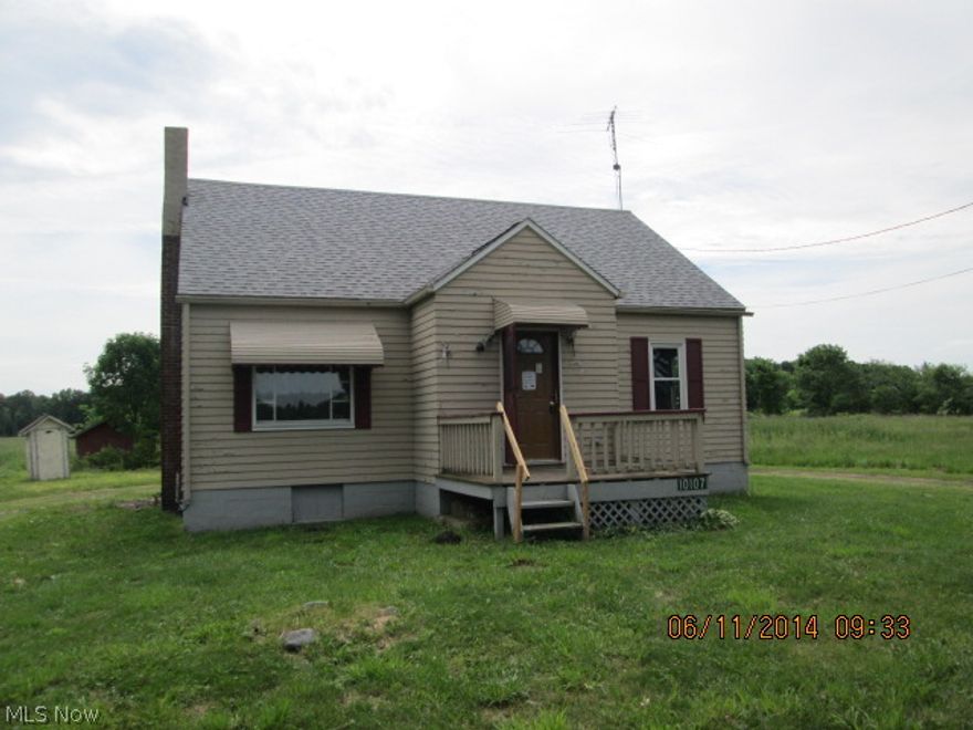 3 bedroom bungalow on 5 acres in West Branch Schools.  Large detached garage. This is a Fannie Mae HomePath property.