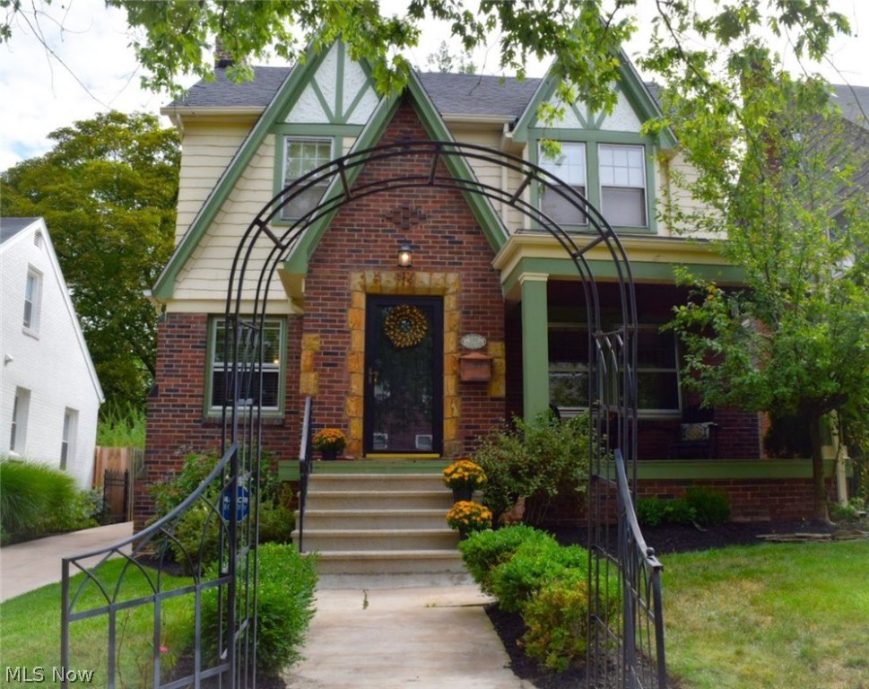 This Vintage Storybook house situated on a quiet cobblestone road has been lovingly improved, updated and maintained. The Living Room and Dining Room features a pretty Stone Fireplace and corner China Cabinet. Charming Eat In Kitchen with Granite Counters, Stainless Steel Appliances, Slate Floor and Painted Cabinets(2018). Oak floors and Hard Rock Maple doors refinished throughout to their original glory! Three Bedrooms and a renovated Full Bath includes Marble floor and Shower, custom glass door, espresso cabinet with granite and hammered nickel sink. Large 4th Bedroom on the third floor includes a large closet and Full Bath added in 2014. It includes Marble floor and Clawfoot Tub. Wood Privacy Fenced in Yard with Custom Black Metal Gate. Cozy Front Porch and rear Stone Patio. Custom Blinds throughout . Updates include Furnace/Humidifier (2012), Concrete Driveway (2013), Exterior Floor and Ceiling on Front Porch, Exterior painted(2017). Many Newer Windows. Will be Point of Sale Compli