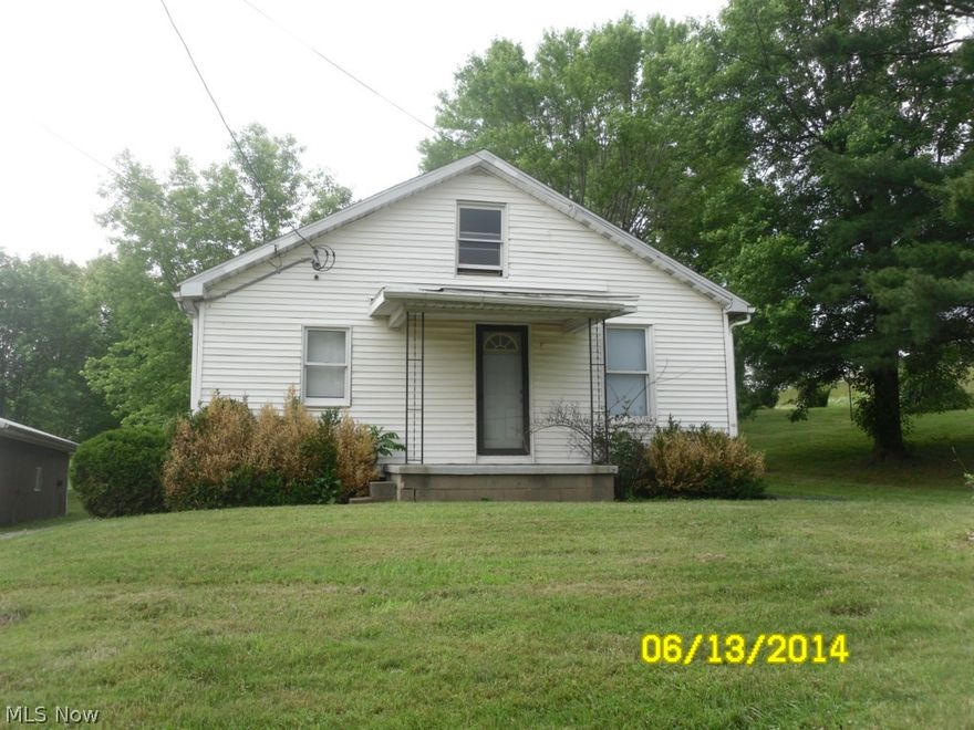 Over five acres, stock barn with paddock plus two other structures.  Three bedroom, one bath updated home.  Property selling as is.