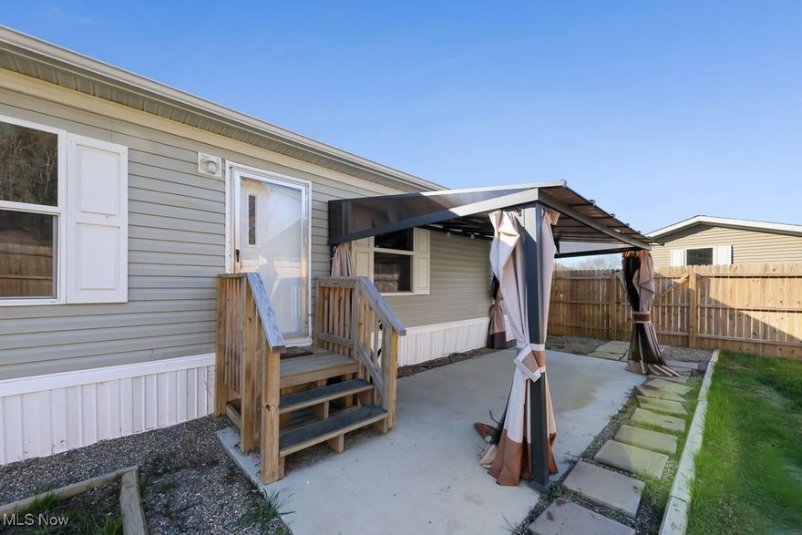 Wonderful opportunity to live in a new 2024 manufactured ranch. This beautiful home offers 4 bedrooms, 2 full baths, spacious open kitchen, dining and living room areas. Kitchen has ample cabinet and counter space. Breakfast bar/work island included, black dishwasher, refrigerator and stove. Large laundry room, master bedroom has full bath and walk in closet. Move in ready. The lot is large and private at the dead end of the park to the left when you pull in main drive. This property features a private backyard which is completely fenced in with a 6" privacy fence. Shed, patio with awning.  All sizes, square feet, and ages estimated.
REMEMBER THIS HOME IS LOCATED AT THE VERY END OF ROAD BESIDE OFFICE. ALL FENCED IN AND PRIVATE.