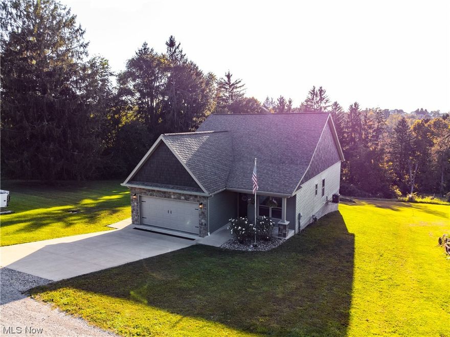 Welcome to 212 McGhee Drive! This home is located perfectly on the edge of town, which gives you that country feeling and the convenience of living close to everything Barnesville has to offer. Built in just 2018, this home offers 3 bedrooms and 2 full baths, all on the main level. The primary suite features a spacious walk-in closet and bathroom with double sinks, soaking tub, and separate shower. The full basement offers 10-foot ceilings and is just waiting for your finishing touches. A third bathroom is already plumbed. This home offers tons of parking space with the attached 2 car garage and newly added gravel parking space. Call today to schedule your private showing!