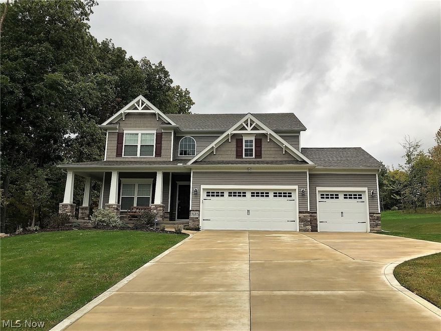 One Year Young Former Model Home! Character surrounds this beautiful 4 bedroom colonial! Landscape is completed front & back. Relaxing from porch welcomes you into 2 story foyer w/laminate flooring. Front study has large windows for natual light. Formal dining rm will accomodate a formal dining suite and seat many. Large living room has plush carpeting, beautiful gas fireplace & a wonderful view of the rear deck/yard. Very Private! Gorgeous kitchen features stainless steel appliances and huge center island w/seating. Granite countertops & beautiful lighting finish this gourmet kitchen. Bright & Sunny All Season room has windows on 3 sides, vaulted ceiling, fan & sliders out to composite deck. 2nd floor offers 3 bedrooms & full bath. Master suite includes walk in closet, large sleeping area and elegant bathroom. Two separate sinks, make-up vanity, tiled walk in shower, private water closet all w/ceramic tile flooring. Full unfinished lower level. Updates include: Alarm system, water sof