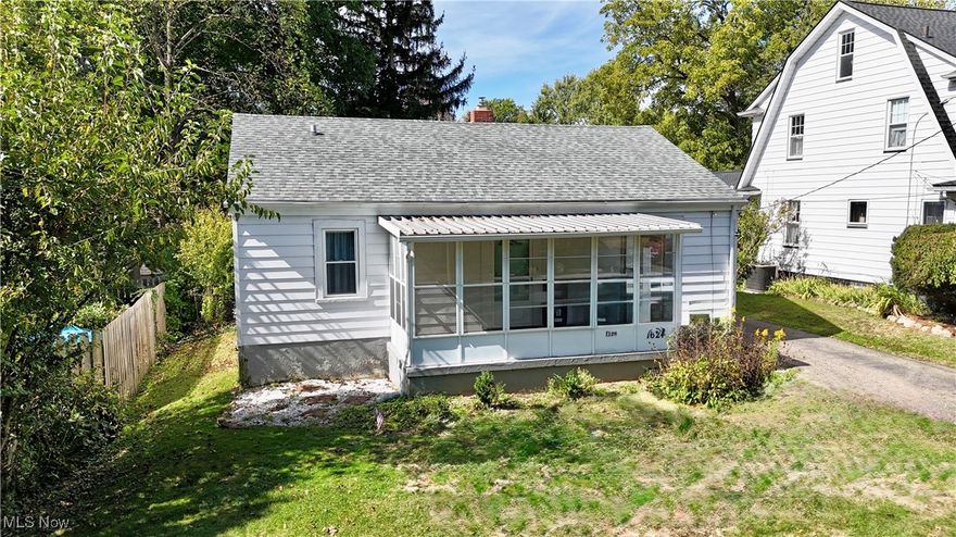 Welcome to 1624 17th Street. This ranch style home features 2 bedrooms, an updated bathroom, and a full basement.  The large living room is open to the dining area which leads to the galley kitchen (appliances included)  The oak hardwoods have been exposed.  The original woodwork/trim and hardware are still in tact.  The oversized one car garage features a newer opener and metal garage door. Many updates:  Furnace 2009, Hot water heater 2020, 200 amp electrical panel and service entrance cable 2025, glass block windows, vinyl replacement windows, The roof is believed to be less than 10 years old, The central air is updated as well.  Aluminum siding. The location is highly desirable.  The basement features an interior water control system with sump pump.  The large unfinished side does have a finished ceiling.  Outside, the large back yard features a chain link fence.  You would only need to fence between the house and the garage for full fencing.  Enjoy the nearby Quirk Cultural Center/City Park as well as The Gorge Metro Park.  Just a few minutes from downtown and the freeway access.  Call your REALTOR today for your private showing!