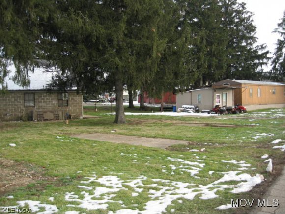 Great income opportunity. 3 to 4 mobile home lots. Two being occupied. current rent $200/mo plus $20/water & sewer. 4 to 5 RV camp sites, rent for $60 week. All lots have water, sewer and electric. River view with boat drop across the street. Two storage buildings on property. Buyers are responsible for adhering to FEMA guidelines regarding mobile home sites and camp sites in flood plain. 4953 Elem: Fort Frye Elementary Elem/Bus: Y JrHigh: Fort Frye JrHigh/Bus: Y High: Fort Frye High School High/Bus: Y Fire: CIT Police: CTY