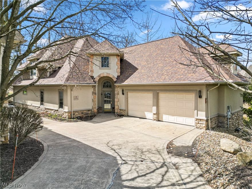 Welcome to luxury living at the Players Club, nestled near the 18th Weiskoph hole of the Quail Hollow golf course. This freestanding end-unit condominium offers an unparalleled view of the serene pond, lush woods, and golf course. It provides the best location in the subdivision, with extra parking and close to guest parking spots. Upon entry, the two-story foyer opens into the formal dining area and eat-in kitchen. The island boasts a counter bar, a built-in oven, an electric range top, a dishwasher, a refrigerator, and a walk-in pantry. Beautiful hardwood floors enhance the kitchen and dining area, creating an elegant ambiance. Beautiful wood columns frame the great room entry, and the massive room with soaring ceilings features gleaming wood floors, a gas fireplace, built-in shelving, and a wall of windows that frame the picturesque views. The first floor also features a versatile office with ceramic tile floors. Step outside to the paved patio with a retractable awning and bask in the tranquility of your surroundings. The luxurious primary bedroom on the first floor offers vaulted ceilings, a walk-in closet, two additional closets, and a glamour bath with dual sinks, a jetted tub, a heated towel rack, and a walk-in shower. Convenience meets comfort with a first-floor laundry area, including a washer, dryer, and a half bathroom for guests, detailing a custom wood wall for added beauty. Upstairs, discover three bedrooms with charming window seats, ample walk-in closets, and attic storage in every room. A loft area overlooks the Great Room and foyer, featuring double large closets for additional storage. Additional features include a roof replaced in 2023, a newer tankless hot water tank, and a one-year home warranty for added peace of mind. This exquisite condominium offers luxury, comfort, and convenience, conveniently located with easy access to TriPoint, UH Concord, Route 44, and I-90. Don't miss the opportunity to make this exceptional property your new home!